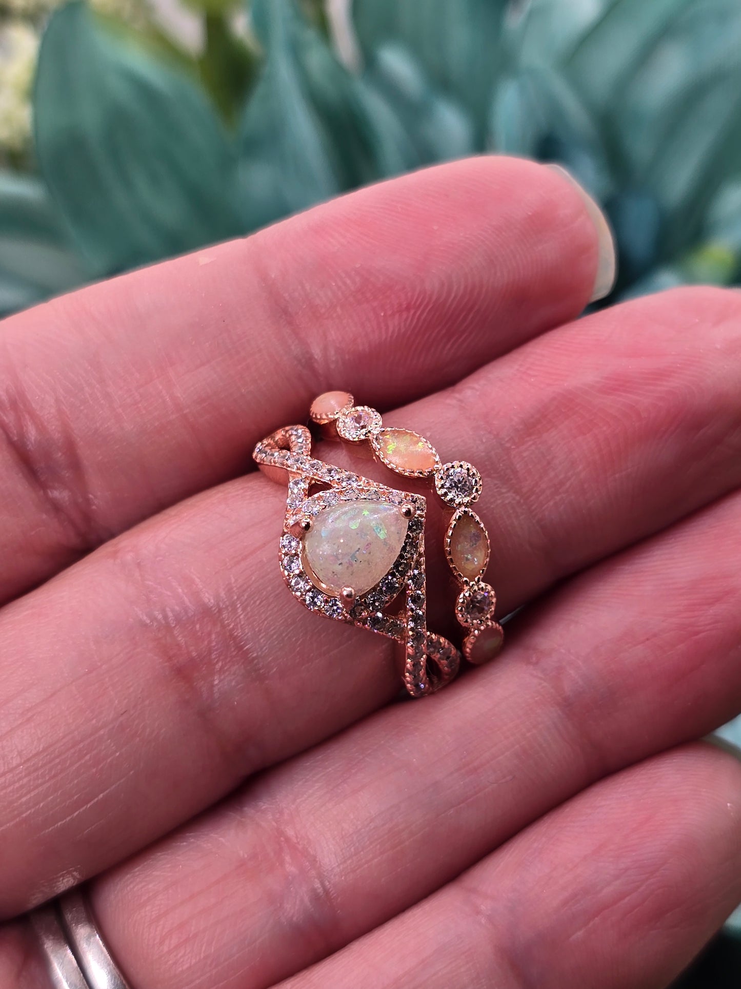 This gorgeous ring has a 6X8mm oval prong center stone setting that can be customized with various inclusions and colors. Metal is solid 925 sterling silver and accent stones are cubic zirconia. The customizable peak stacker can be filled with the same inclusions as the main center stone or designed with a unique look.