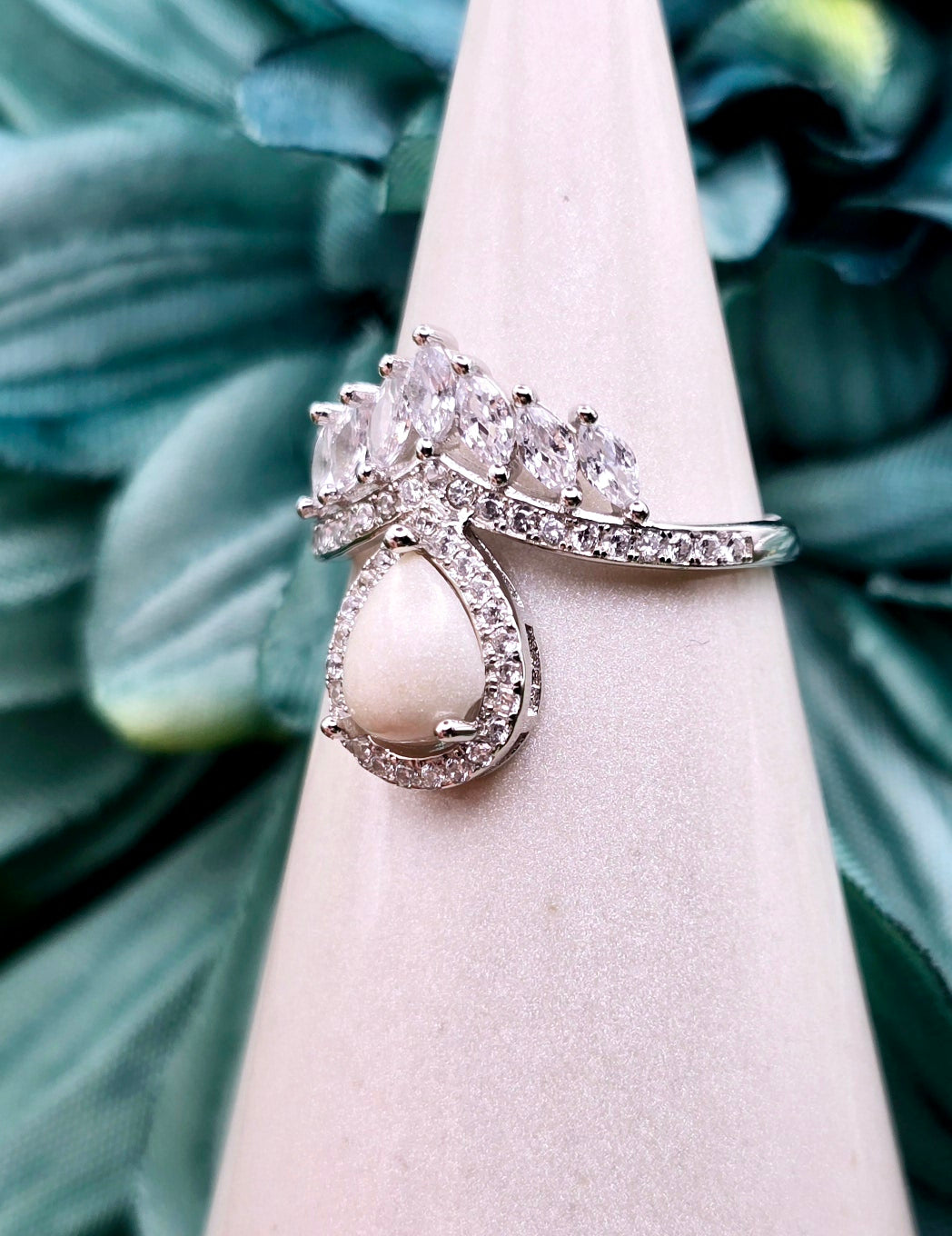 Sentimental by Design presents a gorgeous 925 sterling silver Amaraya ring with a custom center stone created with the inclusions of your choice. Other options include rose gold plated and yellow gold plated metal. 